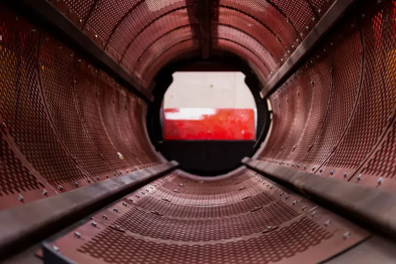 Inside industrial drum cylinder metal tunnel view
