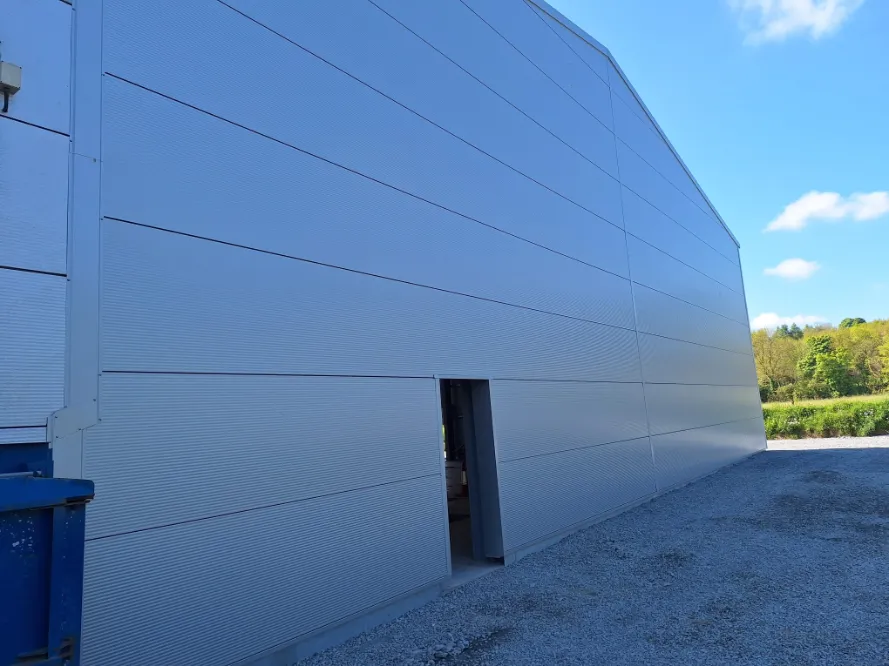 MacFab steel building exterior with curved roof cladding in Ireland