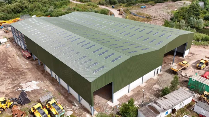 Tusker completed green steel warehouse aerial quarry site UK