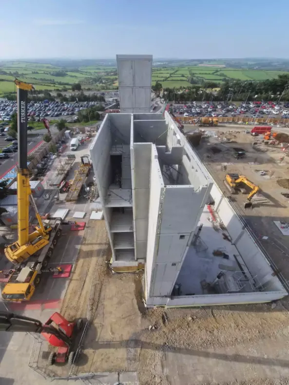 Aerial view of precast concrete building construction in Ireland with Tusker crane