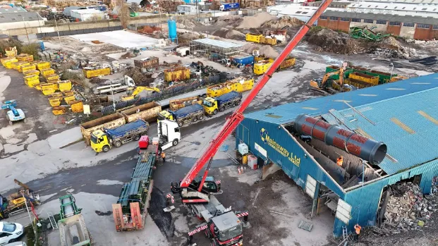 Tusker crane installing trommel drum at Mainsway Recycling UK