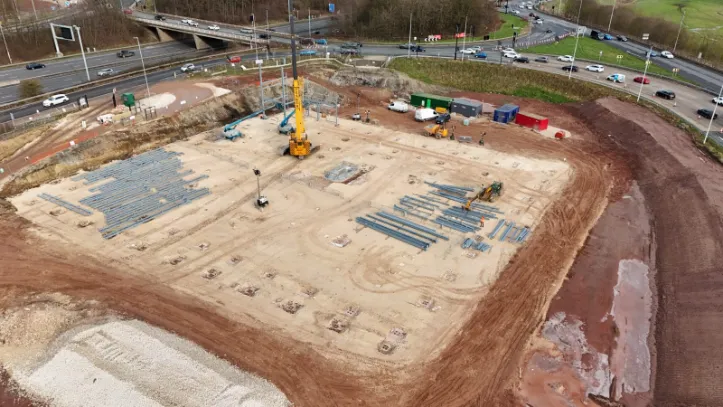 Tusker crane steel frame erection near motorway junction in the UK