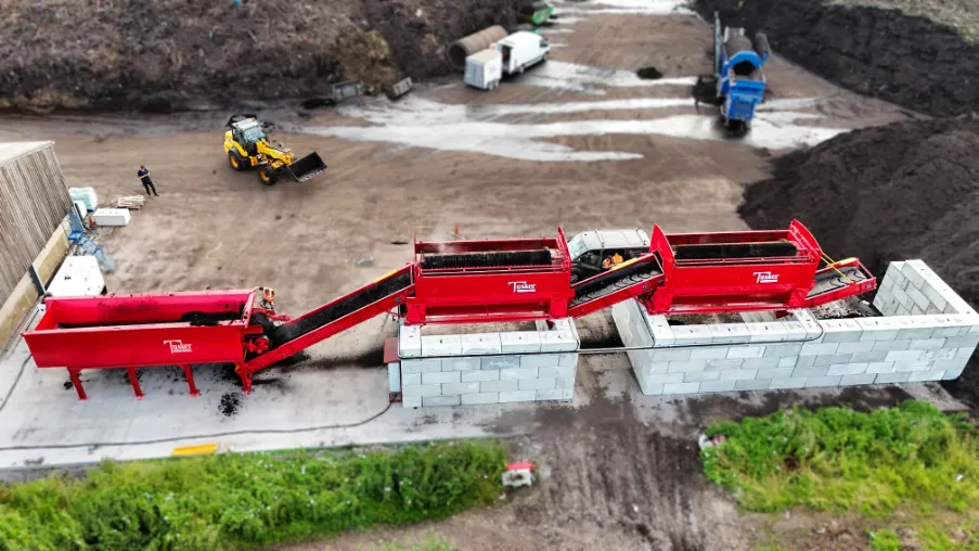 Tusker red trommel conveyor sorting line aerial compost site